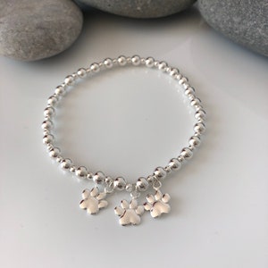Sterling silver paw print bracelet. Sterling silver dog bracelet. Cat lovers gift. Dog lovers gift. Gift for girls. Paw bracelet