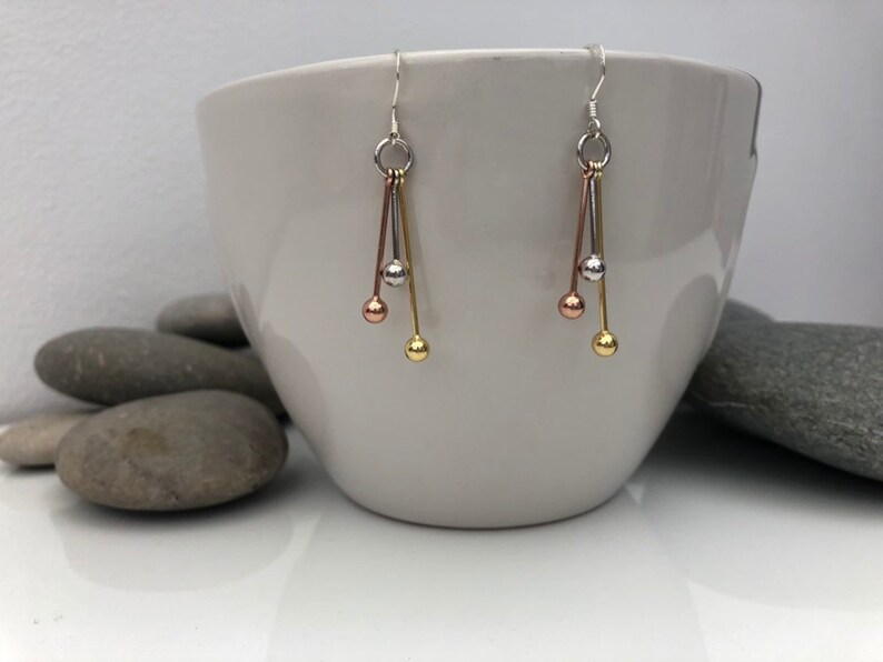 •SHAPE SHIFTER• mixed metal dangle earrings