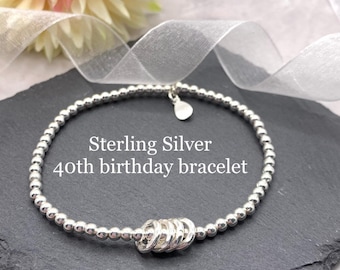 Sterling Silver 40th birthday bracelet. Milestone jewellery gift for her. Elasticated stretch easy to wear design