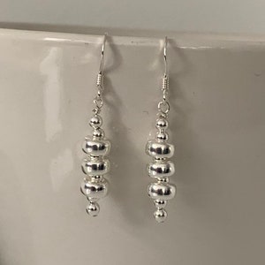 Sterling silver beaded drop earrings. Silver drop earrings. Silver beaded earrings. Silver dangle earrings
