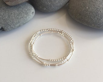 Set of 3 delicate sterling silver beaded noodle bracelets. Silver stacker noodle bracelets