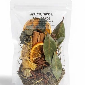 May include: A transparent bag containing a mix of dried herbs, spices, and orange slices. The bag is labelled "WEALTH, LUCK & ABUNDANCE" with a list of ingredients. The contents include cinnamon sticks, star anise, bay leaves, and dried flowers.