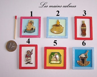 Miniature frame in painted wood decorated with 1 enamel pin. Fourth series