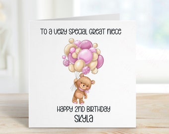 May include: A birthday card with a cute cartoon bear holding pink and beige balloons. The card says "To a very special great niece" and "Happy 2nd Birthday Skyla".