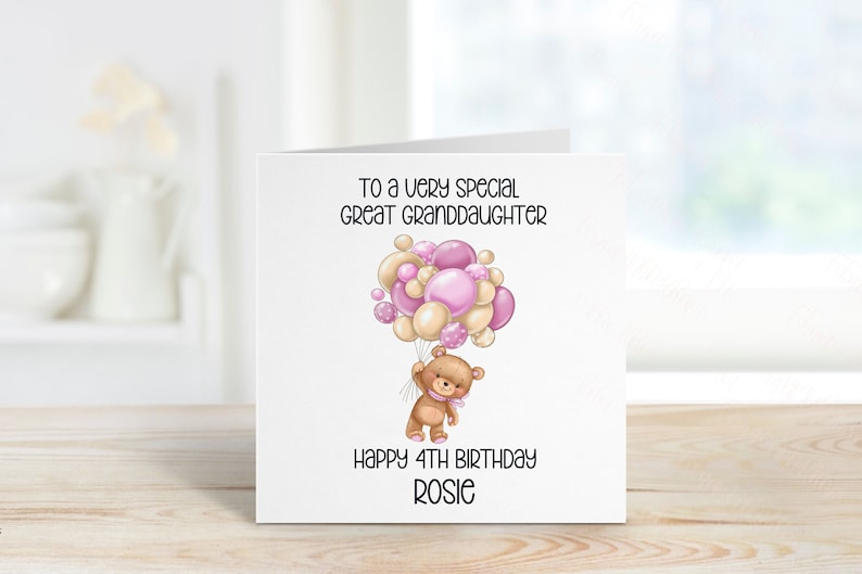 May include: A white card with a pink and beige teddy bear holding balloons. The card reads "To a very special great granddaughter Happy 4th Birthday Rosie".