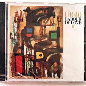Op de afbeelding: Een compact disc-hoesje met het album Labour of Love II van UB40. De hoes toont een abstract schilderij met gedurfde zwarte vormen, een rode rechthoek, een geel vierkant en een groen vierkant tegen een getextureerde beige en bruine achtergrond.
