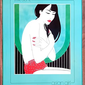 May include: Illustration of a woman with black hair, red lips, and red nail polish, wearing red polka dot shorts. The artwork is framed in a teal border with the text "josie diane" at the top and "asian girl" at the bottom.