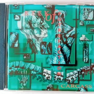 May include: A CD case with a green, blue, and red design. The title of the album is "Reek of Putrefaction" and the artist is "Carcass".