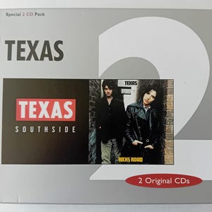 May include: A two-CD pack of music by the band Texas. The front cover features the band's name in large, bold letters. The back cover features a photo of the band members and the album titles "Southside" and "Ricks Road". The text "2 Original CDs" is printed on the bottom of the back cover.