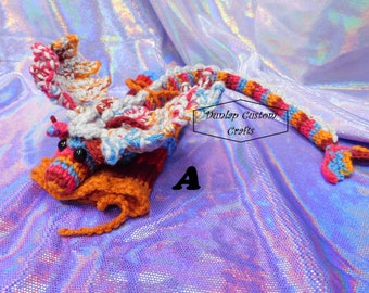 ¡Mascotas dragón para llevar puestas! ¡Dragones de muñeca sin cables! ¡Con alas brillantes!