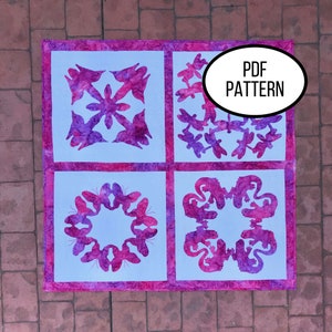 May include: A quilt block pattern with four different designs. Each design features a different silhouette of a bird, butterfly, or dragonfly. The quilt block is made of a pink and white fabric with a light blue background. The text "PDF PATTERN" is visible in the image.