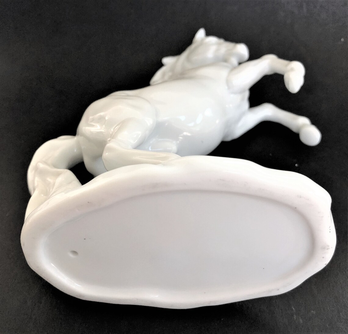 white porcelain horse statue