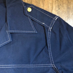 Vintage 1960's Men's M Navy Blue Short Sleeve Tunic Top with White Contrast Stitching, Double Hip Pockets, Notched Collar, and Snap Buttons image 2