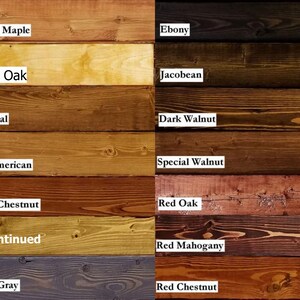 May include: A wood stain color chart featuring sixteen horizontal planks with visible grain patterns. Labels include Colonial Maple, Ebony, Golden Oak, Jacobean, Provincial, Dark Walnut, Early American, Special Walnut, English Chestnut, Red Oak, Discontinued, Red Mahogany, Classic Gray, and Red Chestnut.