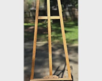 May include: A rustic wooden sign with the text "Welcome to our home" in white lettering. The sign features a distressed finish and a simple, inviting design, perfect for a front porch or entryway.