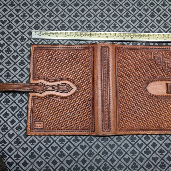 J.M. Capriola - Elko Nevada Tooled Leather Portfolio KJR