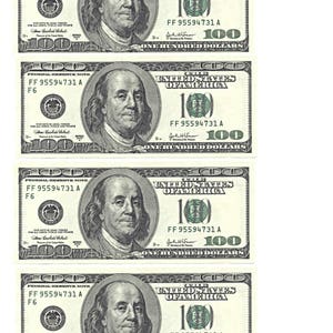 May include: Four $100 US dollar bills with the serial number FF 95594731 A. The bills are stacked on top of each other. The bills are in good condition and have no visible tears or creases.