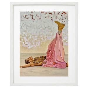 May include: A painting of a person lying on their back with one leg raised in the air. The person is wearing a pink skirt and a gold top. The background is a white brick wall.