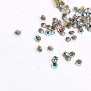 48 Pieces Crystal AB Swarovski Xilion Chatons, Article #1028, 14pp (2mm Round), Pointed Back, Vintage