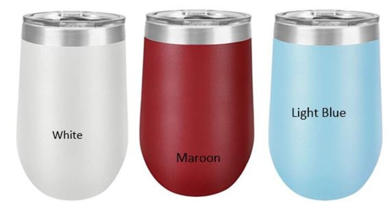 May include: Three stainless steel wine tumblers in white, maroon, and light blue. The tumblers have a silver lid and a rounded bottom. The colors are labeled below each tumbler.