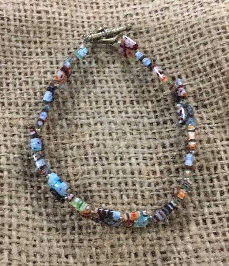 Handmade floral rainbow glass bracelet