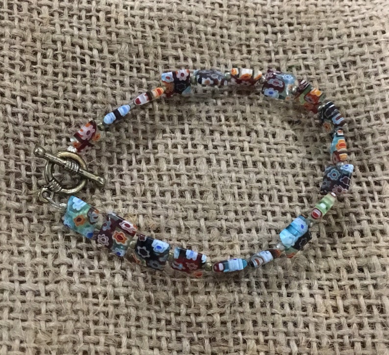 Handmade floral rainbow glass bracelet