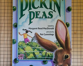Children's book - Pickin Peas retold by Margaret Read MacDonald is a Hard cover book with dust jacket 1998 Harper Collins