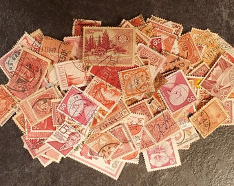 50 Worldwide postage stamps in shades of RED used, off paper crafting fun possible duplicates ephemera junk journal scrapbooking