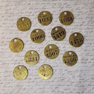 Vintage Round Brass Tool Check Brass Tags The BBC Company assemblage