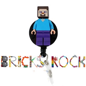 May include: A blue and purple Lego Minecraft character on a black retractable badge reel with the word "BRICKSROCK" spelled out in Lego bricks below.