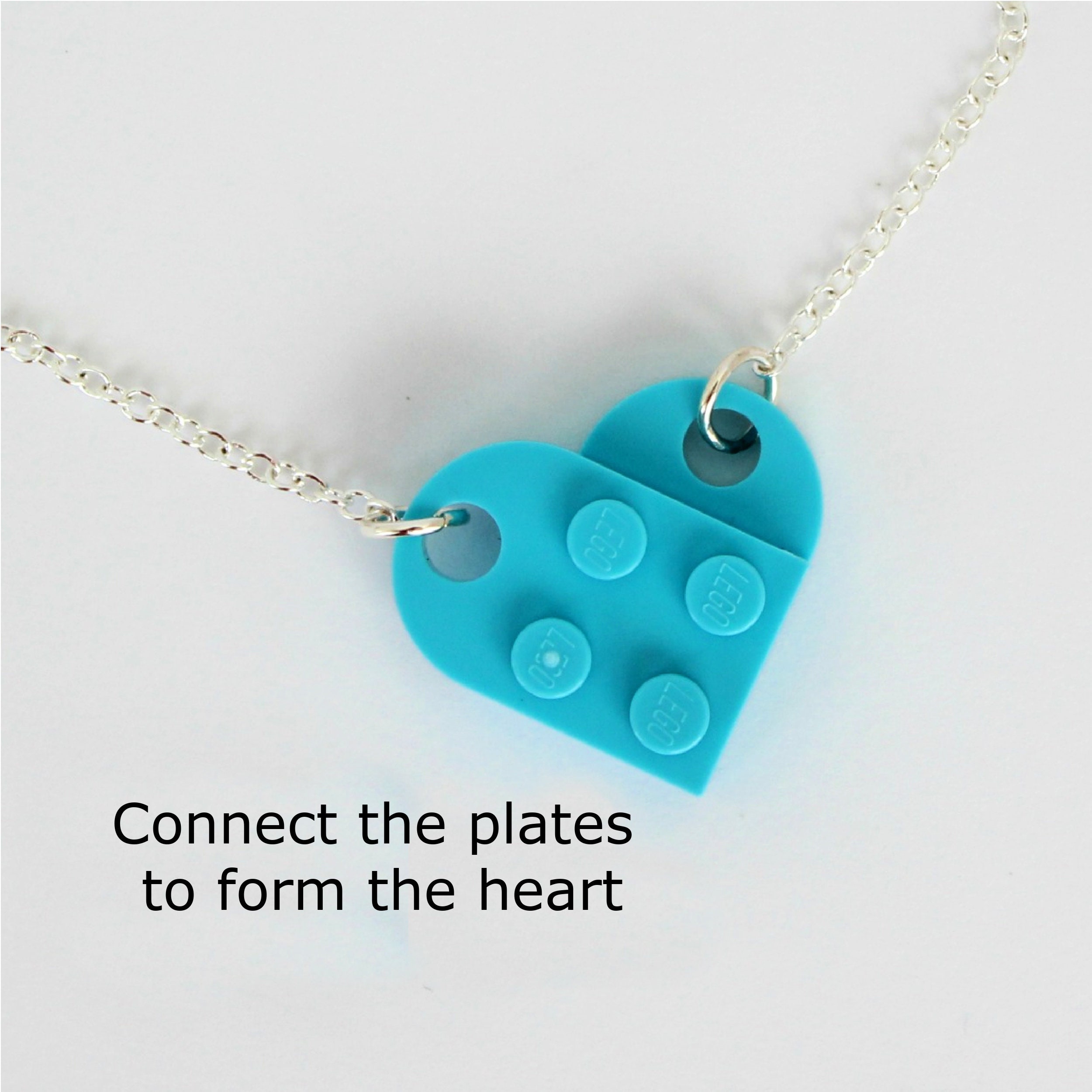 Blue lego heart necklace deals