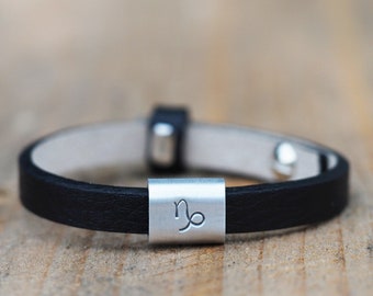 Black leather bracelet for children with engraved zodiac signs