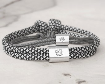 Father son bracelets with different motifs, for example bear, shark, dog paw or anchor