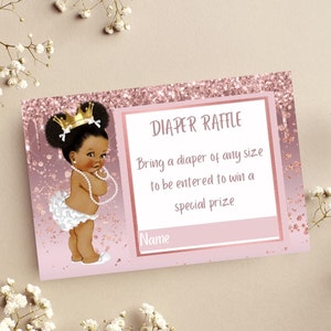 May include: A pink baby shower diaper raffle card featuring a cartoon baby girl with a gold crown and pearls. The card includes the text "DIAPER RAFFLE" and instructions for the raffle, with space for a name.