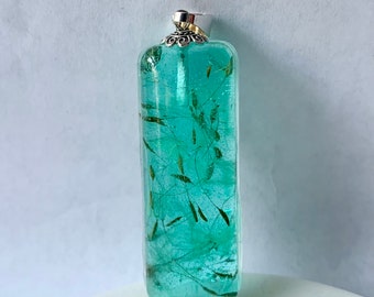 Aqua dandelion seed resin necklace pendant