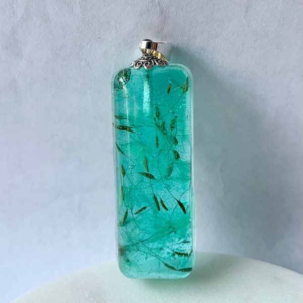 Aqua dandelion seed resin necklace pendant