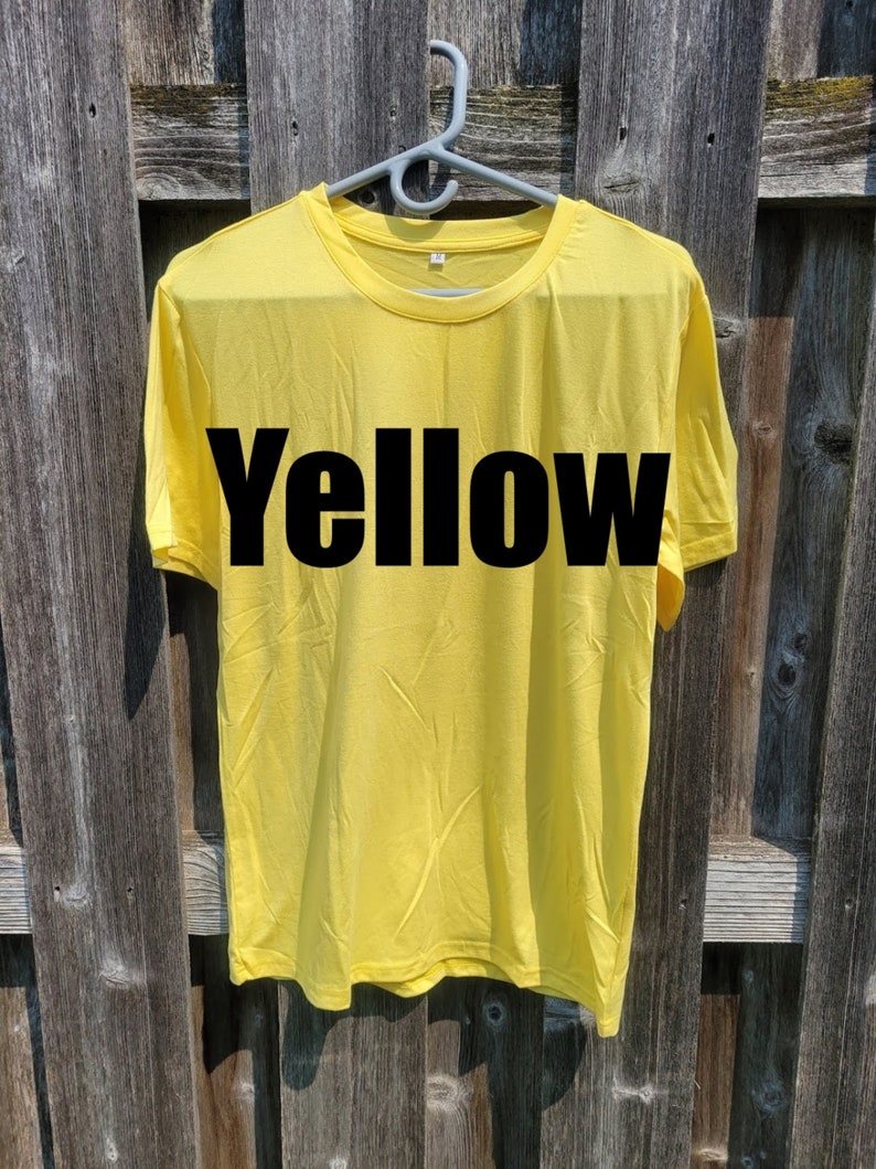 May include: A yellow t-shirt with the word "Yellow" printed in black on the front.