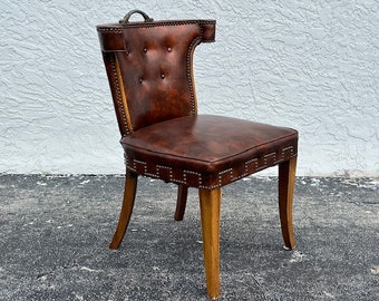 Brown Leather Desk Chair with Handle and Brass Tack Heads Outlined by a Greek Key Design