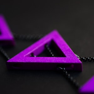 3 triangles geometric 3d printed jewelry purple necklace jewelry a black chains goes through the triangles creating unusual intersections