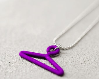 3d printed pendant necklace in the shape of a coat hanger; gift for a girls who loves fashion shopping, influencer, blogger, sales assistant