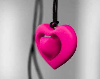 3d printed pendant necklace heart pink valentine gift with rotating mechanism a smaller heart rotates inside a bigger one romantic present