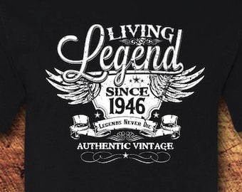 May include: Black t-shirt with a white graphic that says "Living Legend Since 1946" with a vintage style design. The graphic includes wings, a star, and the text "Legends Never Die" and "Authentic Vintage".