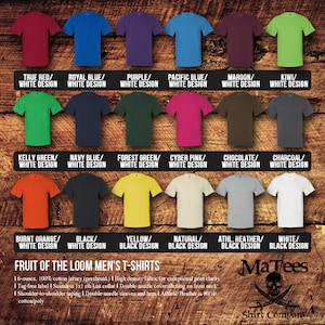 May include: A display of various Fruit of the Loom men's t-shirts in multiple colors, including red, blue, green, and orange. Each shirt has a white design. The image also includes text describing the shirt's features and the brand name.