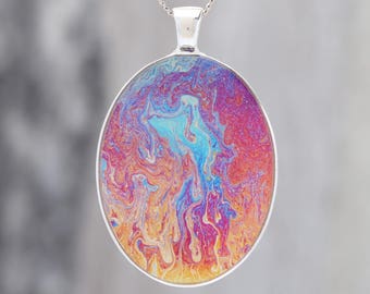 Still Dancing  - Glow-in-the-dark pendant with a beautiful abstract soap film pattern