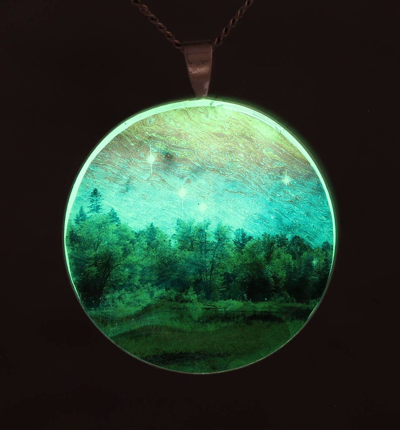 Dancing Sky Glow-in-the-dark pendant with a surreal image of trees image 2