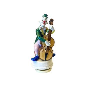 Vintage Maruho Japan MUSIC BOX Circus Clown Playing Cello Music Instrument Porcelain FigurinePlays &quot;Send In The Clowns&quot;