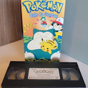 Tarjetas de videojuego POKEMON VHS Wake Up Snorlax Nintendo 1998 Tomy Pikachu Charizard Eevee Sylveon Snorlax Gengar Charmander Bulbasaur Squirtle