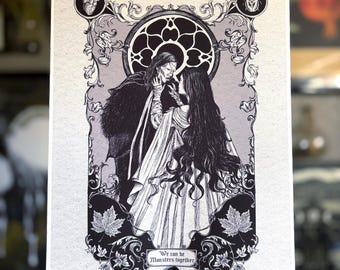 May include: Black and white gothic art print featuring a couple embracing, set against a circular stained-glass window design. The artwork includes ornate floral and leaf motifs, with the text "We can be Monsters together".
