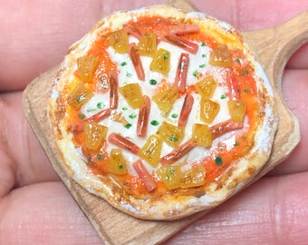 Miniature Hawaiian pizza