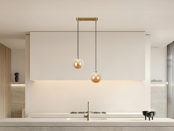 2つの透明なグローブガラスシェードを備えたモダンなペンダントライト